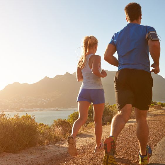 Stylized figure stretching in an open lime-toned landscape
